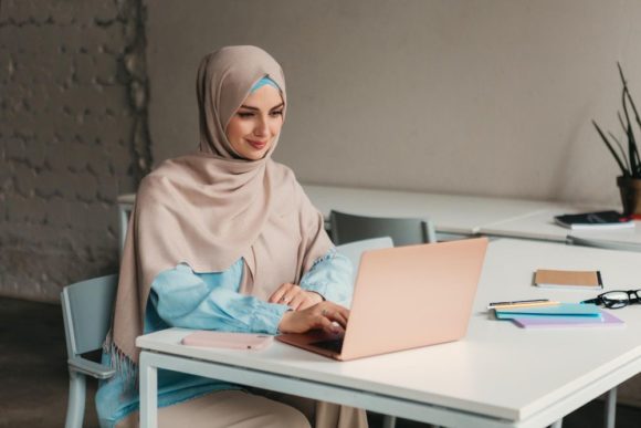 modern-muslim-woman-studying-online